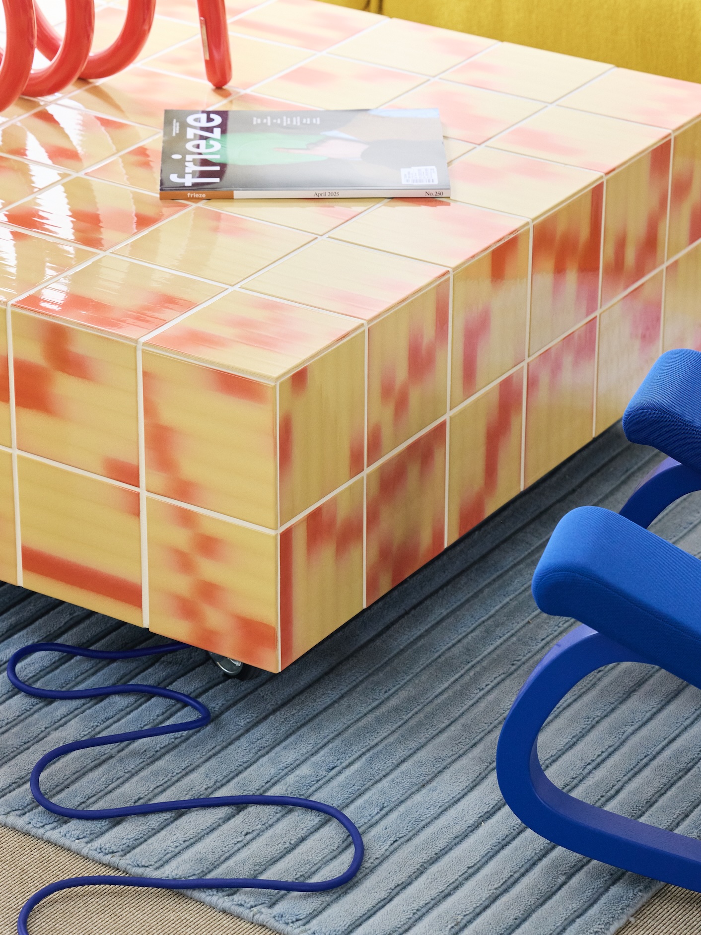 Podimo Norway office orange red table blue carpet